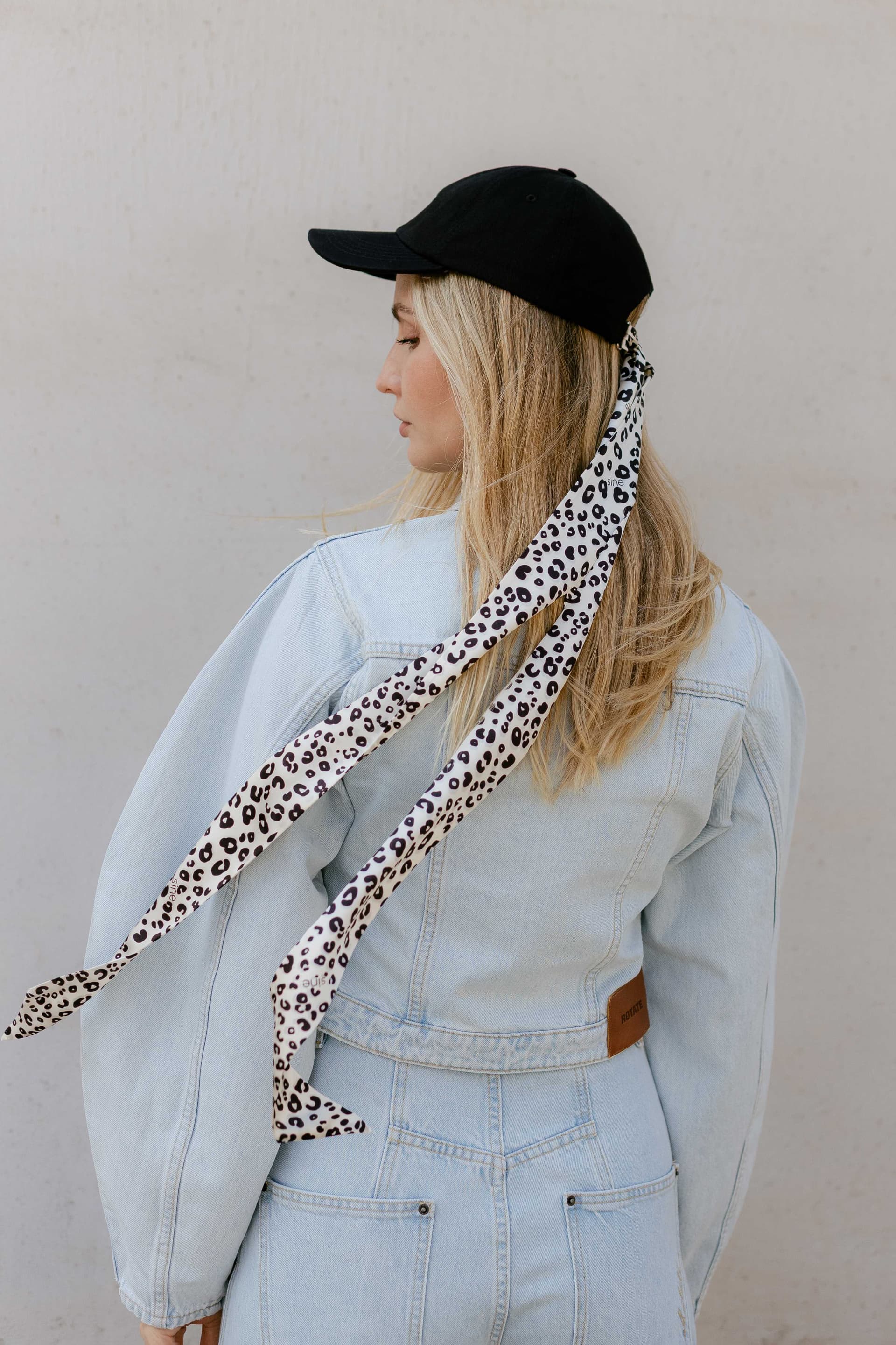 Black baseball cap with optional silk accessory