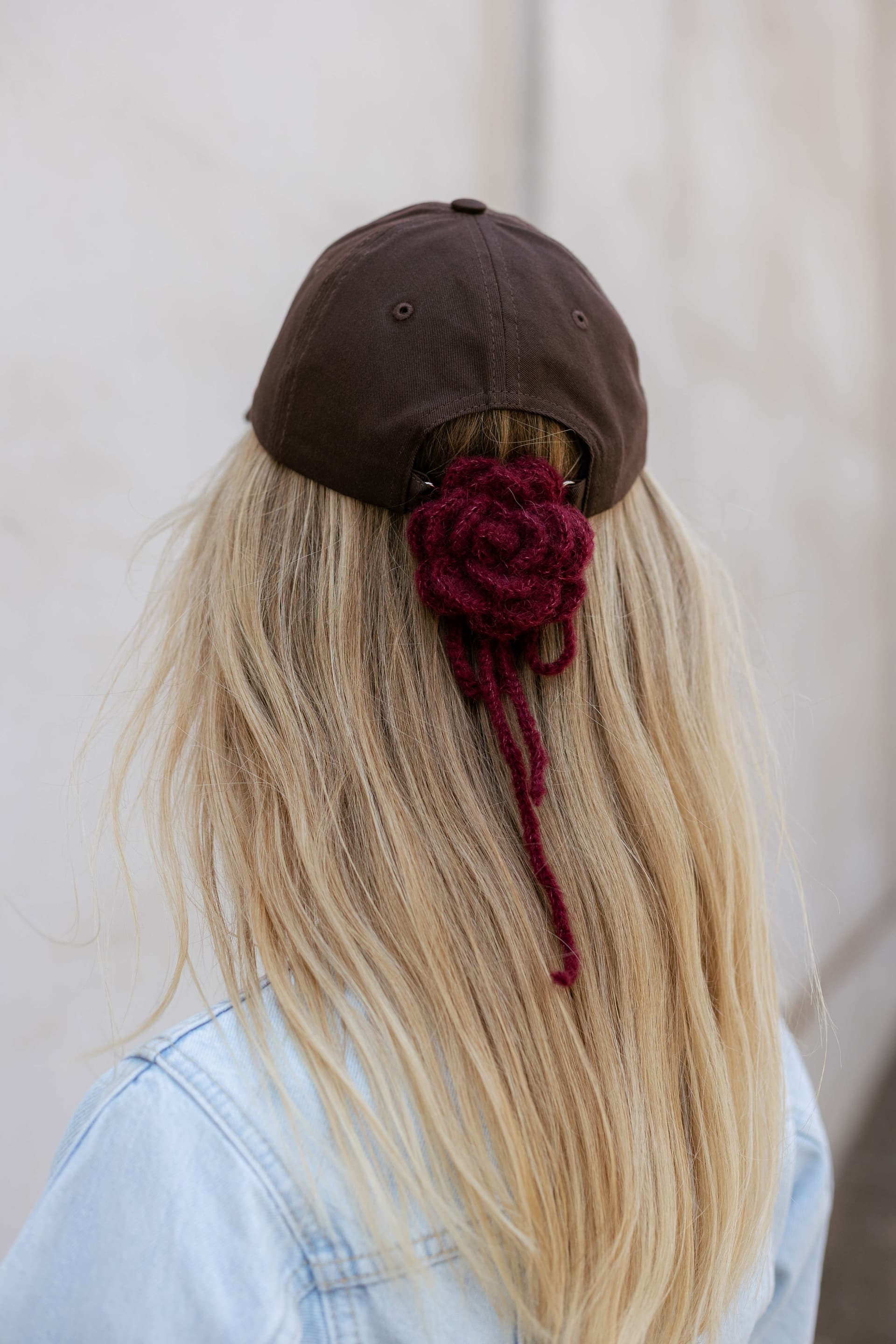 Brown baseball cap with optional silk accessory