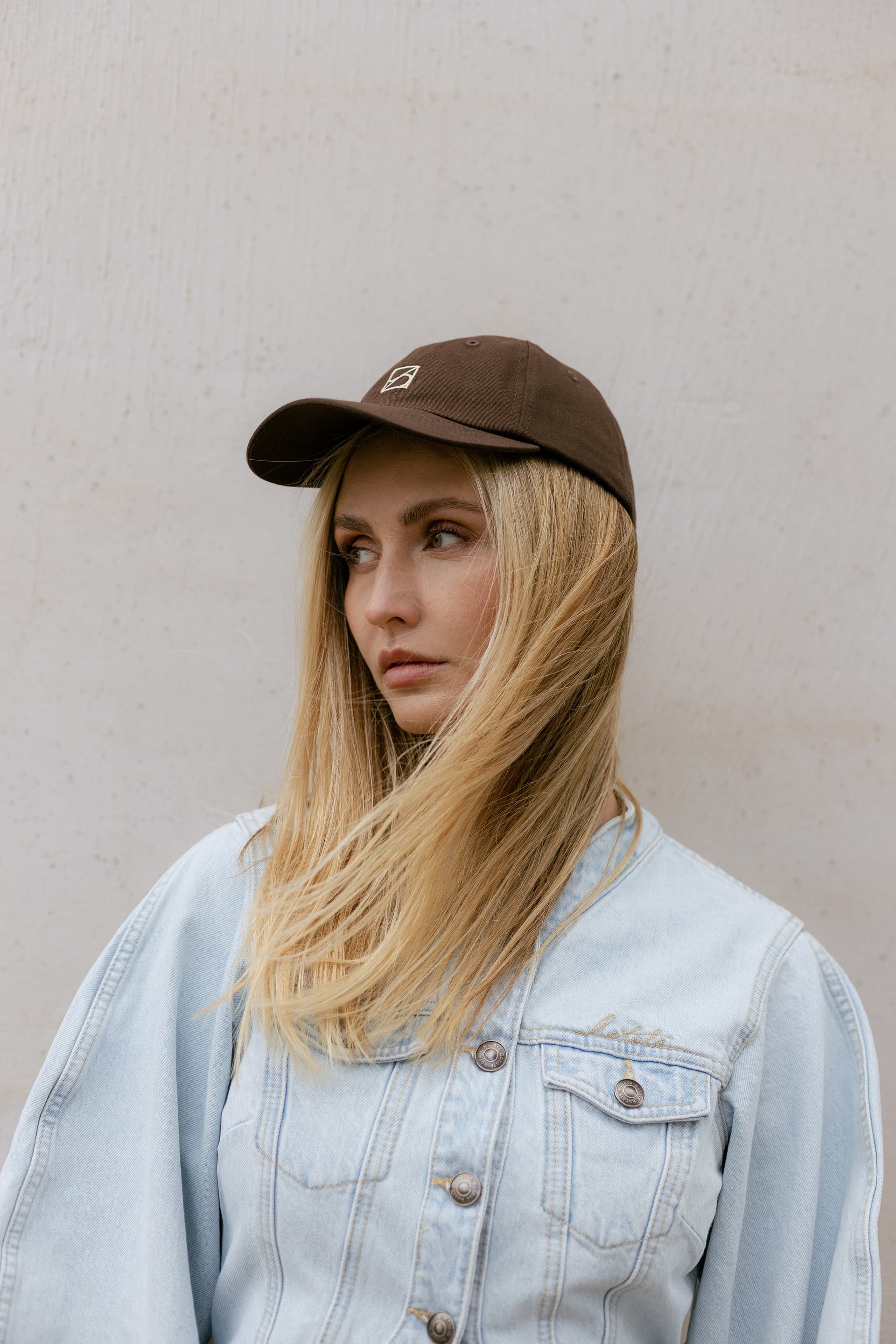 Brown baseball cap with optional silk accessory