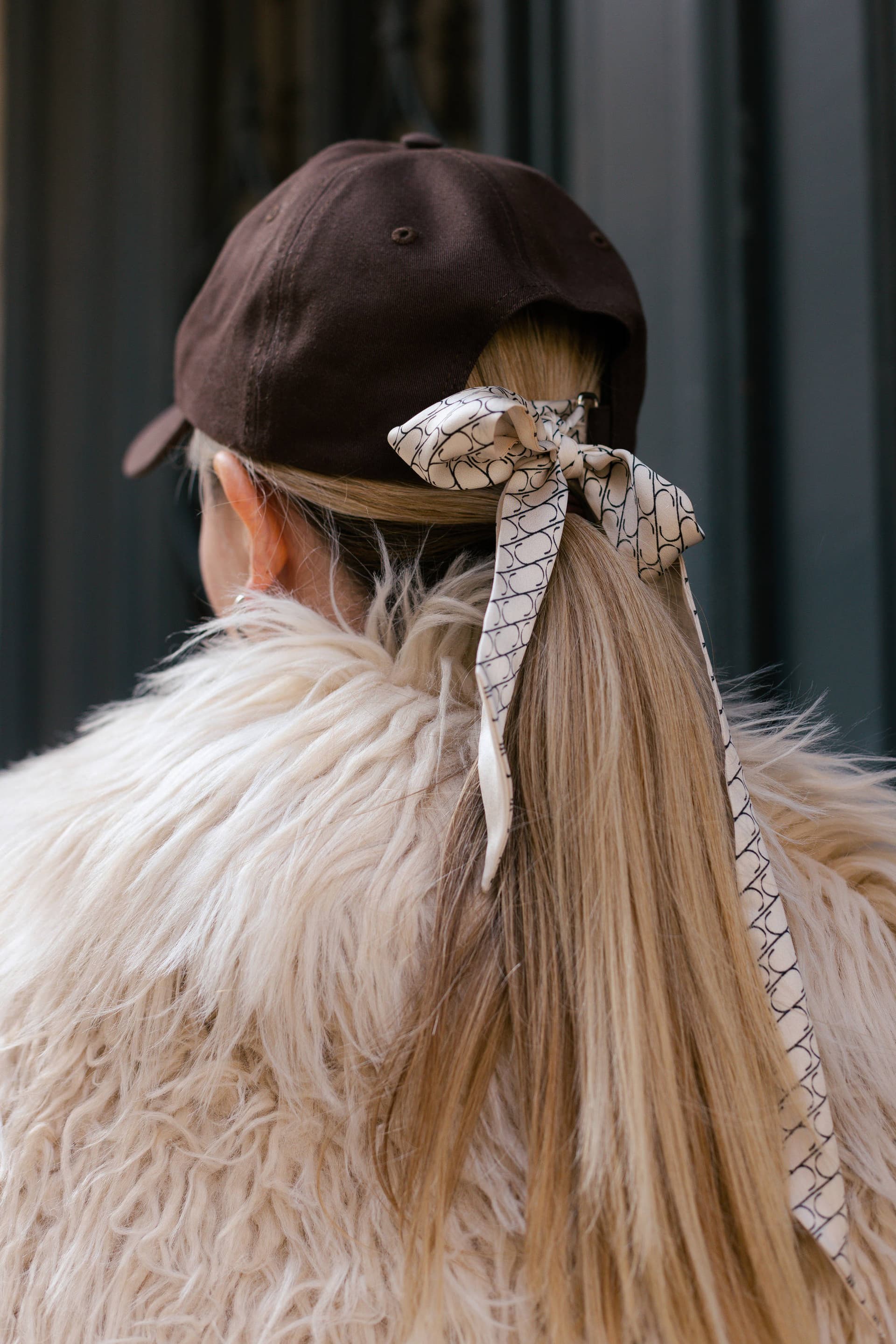Brown baseball cap with optional silk accessory